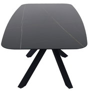 Moderner schwarzer Esstisch mit rechteckiger Tischplatte und schrägen Beinen, Ansicht von oben.