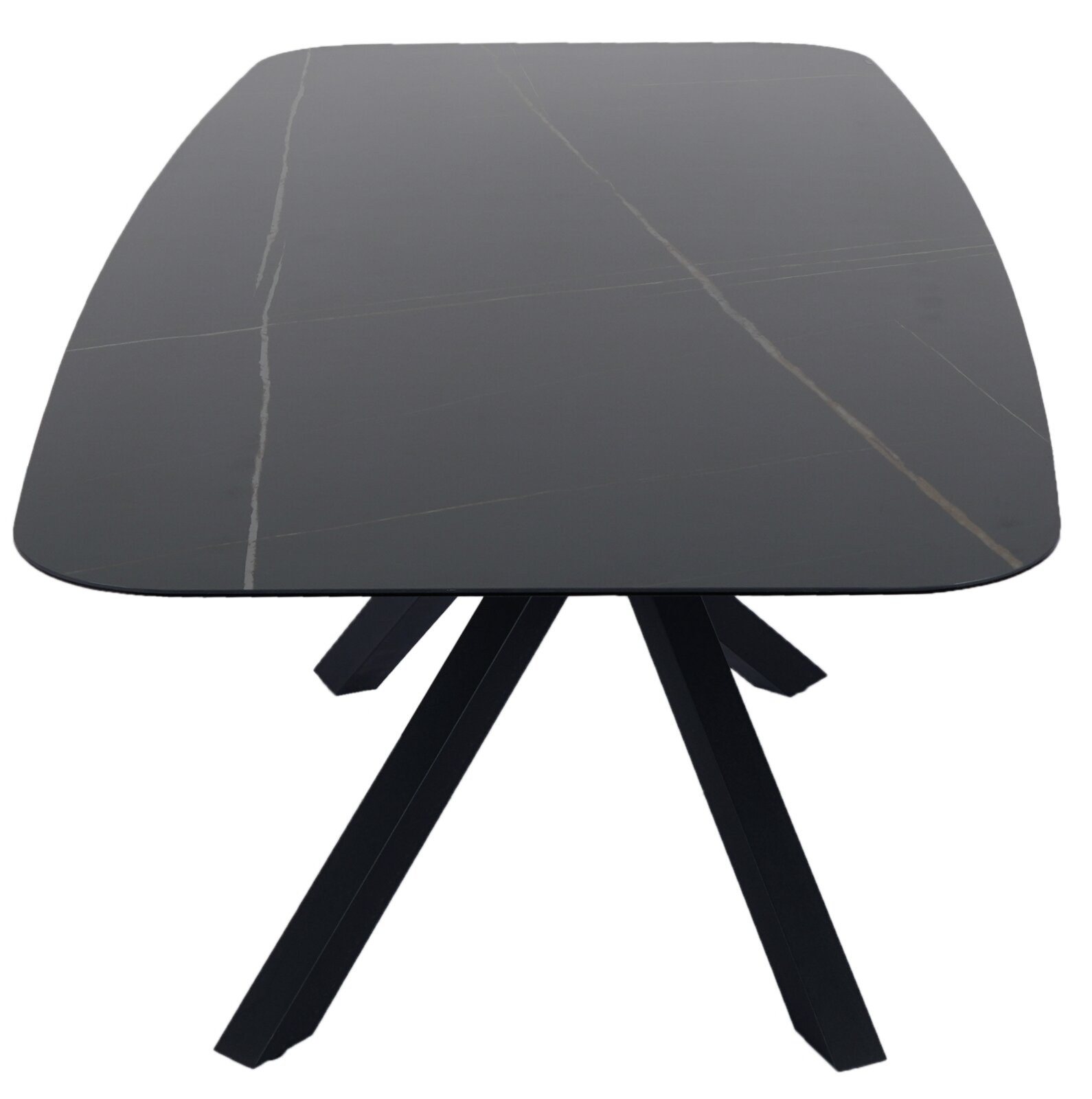 Moderner schwarzer Esstisch mit rechteckiger Tischplatte und schrägen Beinen, Ansicht von oben.