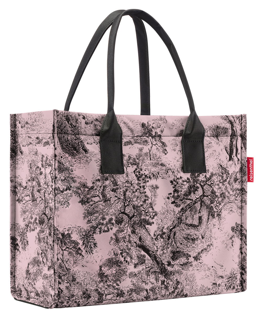 Rosa Einkaufstasche mit schwarzem, detailliertem Landschaftsmuster und schwarzen Griffen, seitliche Perspektive