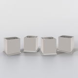 Vier quadratische Metallfüße für Unterschränke, aus frontaler Perspektive fotografiert.