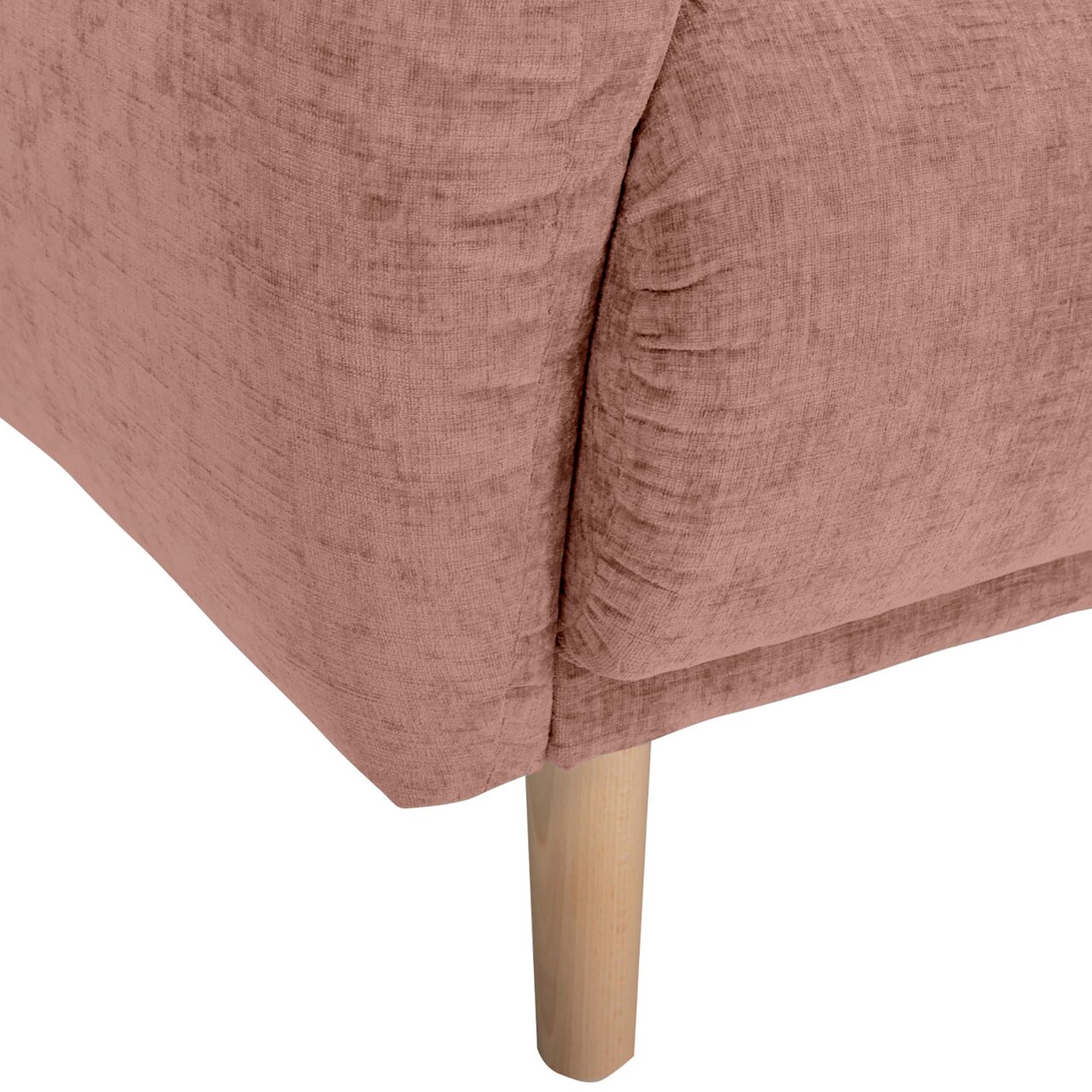 Nahaufnahme einer rosafarbenen Sofaecke mit Holzbein, Perspektive von der Seite.