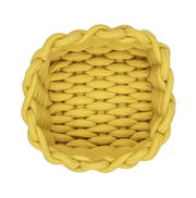 Runder, senfgelber Badkorb aus geflochtenem Material, von oben betrachtet.