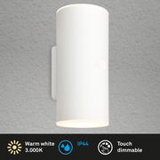Weiße zylindrische Akku-Außenwandleuchte mit warmweißem Licht, IP44-Schutz und Touch-Dimmfunktion, seitliche Perspektive.