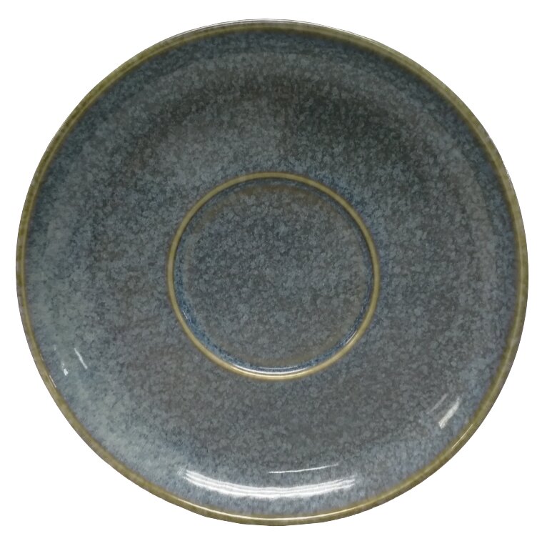 Blaue Untertasse mit gesprenkeltem Muster, von oben betrachtet