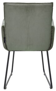 Rückansicht eines grünen Armlehnstuhls mit geripptem Stoffbezug und schwarzen Metallbeinen