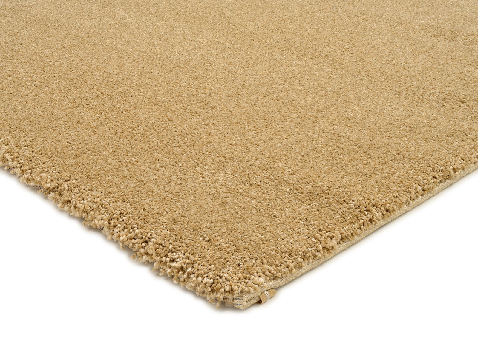 Beige Uni-Teppich in Nahaufnahme, perspektivisch von der Ecke aus gesehen