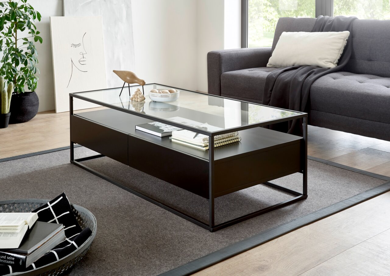 Zurbrüggen Couchtisch EVORA Moderner Couchtisch mit Glasplatte und schwarzem Metallrahmen, seitliche Perspektive