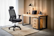 Moderner Rollcontainer aus Holz mit drei Schubladen, neben einem Schreibtisch in einem stilvollen Büro, seitliche Perspektive.
