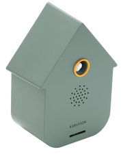 Grüne Soundbox in Form eines Hauses mit Lautsprechergitter und gelbem Ring, seitliche Perspektive