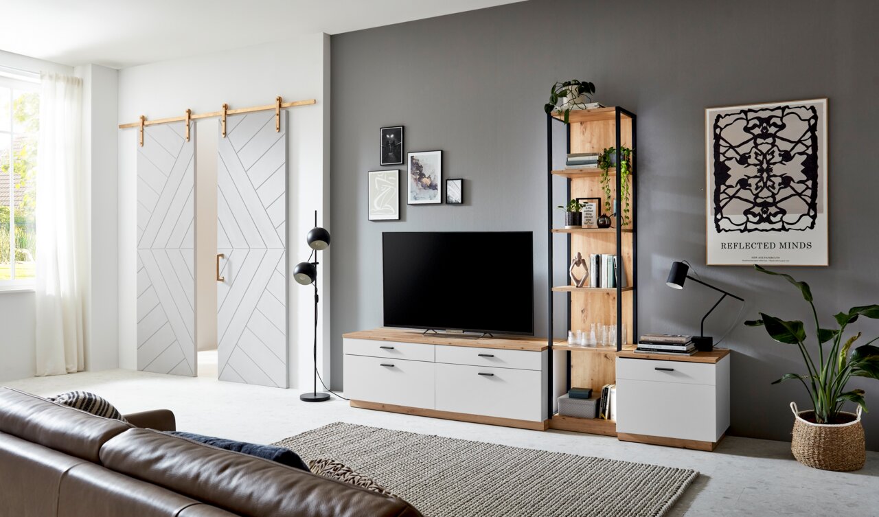 XORA Wandcombinatie BAMEOS Moderne woonkamerwandcombinatie met tv-meubel, boekenkast en kast in hout- en wittinten, zijaanzicht.
