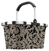 Carrybag mit floralem Muster in Schwarz und Beige, seitliche Perspektive