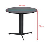 Runder Beistelltisch mit schwarzer Tischplatte und dreibeinigem Metallgestell, seitliche Perspektive