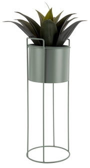 Pflanzgefäß in einem modernen, hohen Metallständer mit grüner Pflanze, seitliche Perspektive