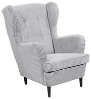 Grauer Sessel mit geripptem Stoffbezug, Vorderansicht leicht von der Seite