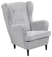 Grijze fauteuil met geribbelde stoffen bekleding, vooraanzicht licht van opzij