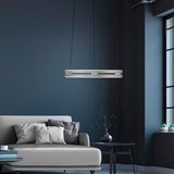 Moderne Pendelleuchte PURE E-Loop in einem stilvollen Wohnzimmer, seitliche Perspektive