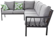 Lounge-Set in L-Form mit grauen Kissen und grünen Zierkissen mit Blattmuster, seitliche Perspektive