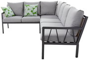 Lounge-Set in L-Form mit grauen Kissen und grünen Zierkissen mit Blattmuster, seitliche Perspektive