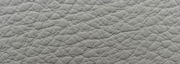 Nahaufnahme einer grauen, strukturierten Lederoberfläche, verwendet für einen Sessel.