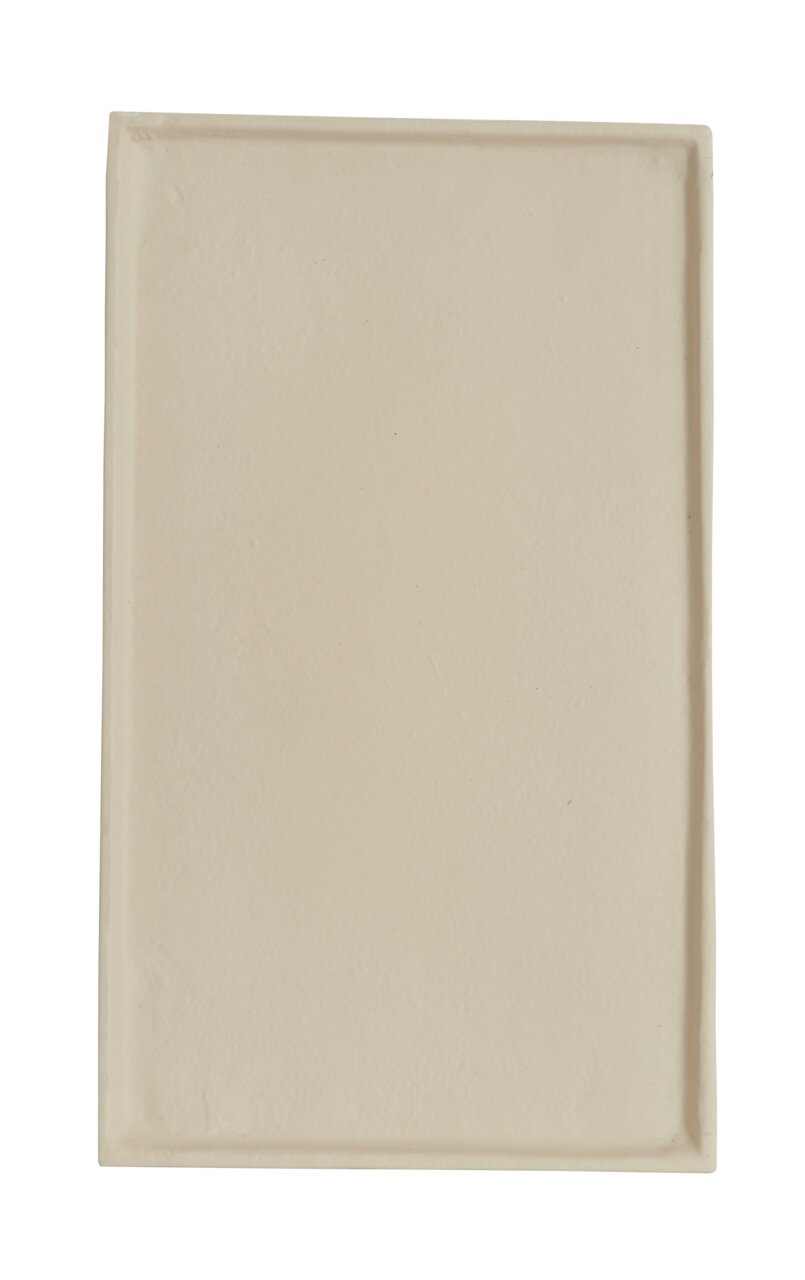 Rechteckige, beige Schale aus Keramik, von oben betrachtet.