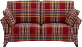 Vorderansicht eines 2,5-Sitzer Sofas mit rot-kariertem Muster und zwei passenden Kissen.