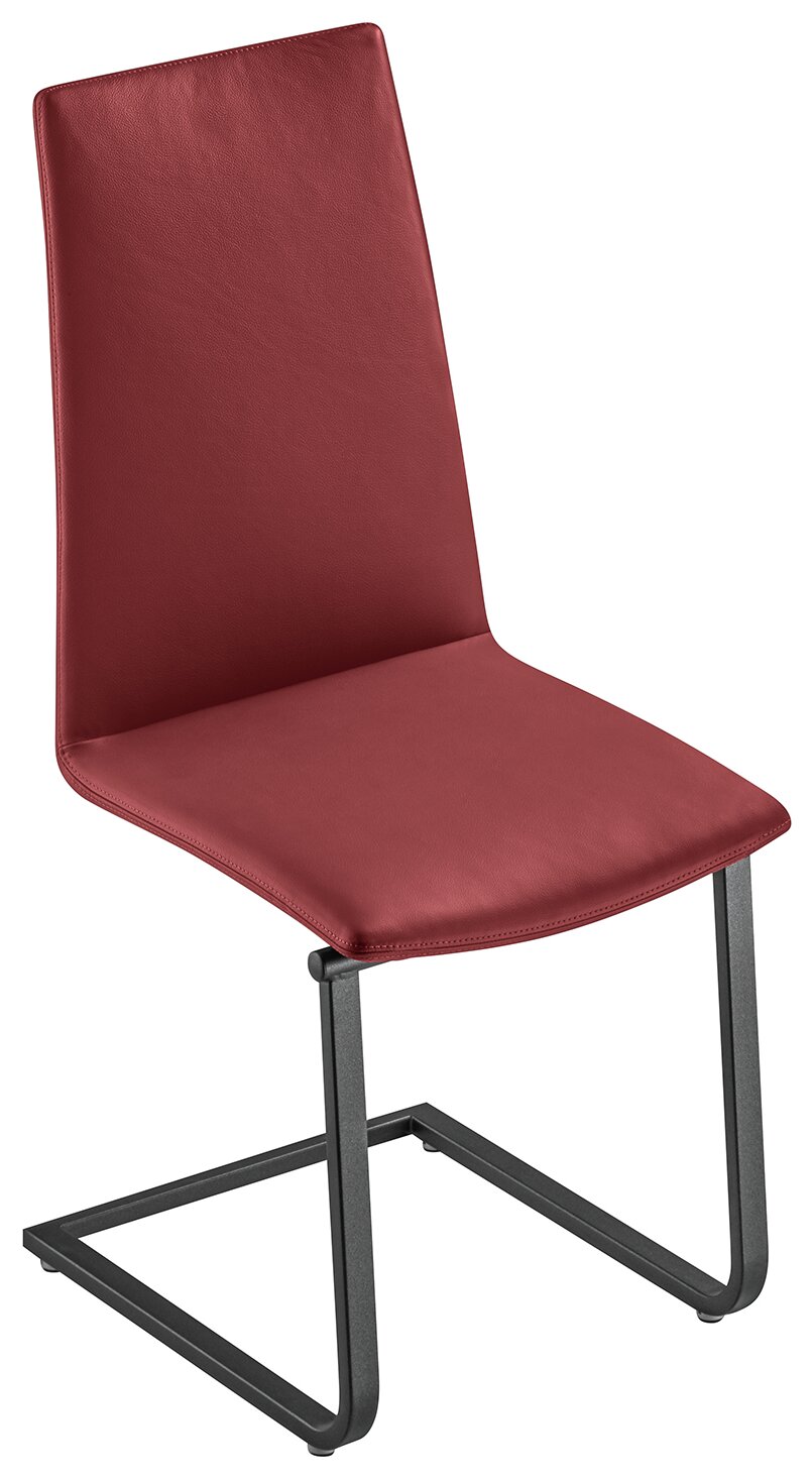 Moderner Stuhl mit rotem Kunstlederbezug und schwarzem Metallgestell, seitliche Perspektive