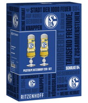Ritzenhoff Schalke 04 Pilstulpen im 2er-Set in blauer Geschenkverpackung, dargestellt in leicht erhöhter Dreiviertelansicht von vorn links