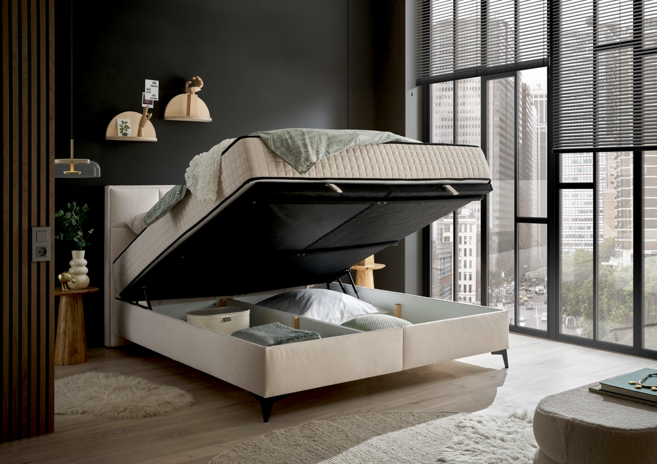 Boxbett mit hochgeklappter Matratze und Stauraum, seitliche Perspektive in modernem Schlafzimmer