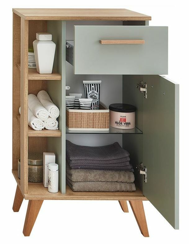 Moderner Unterschrank mit offenen Regalen und Schublade, gefüllt mit Handtüchern und Pflegeprodukten, aus Holz und in Frontansicht.