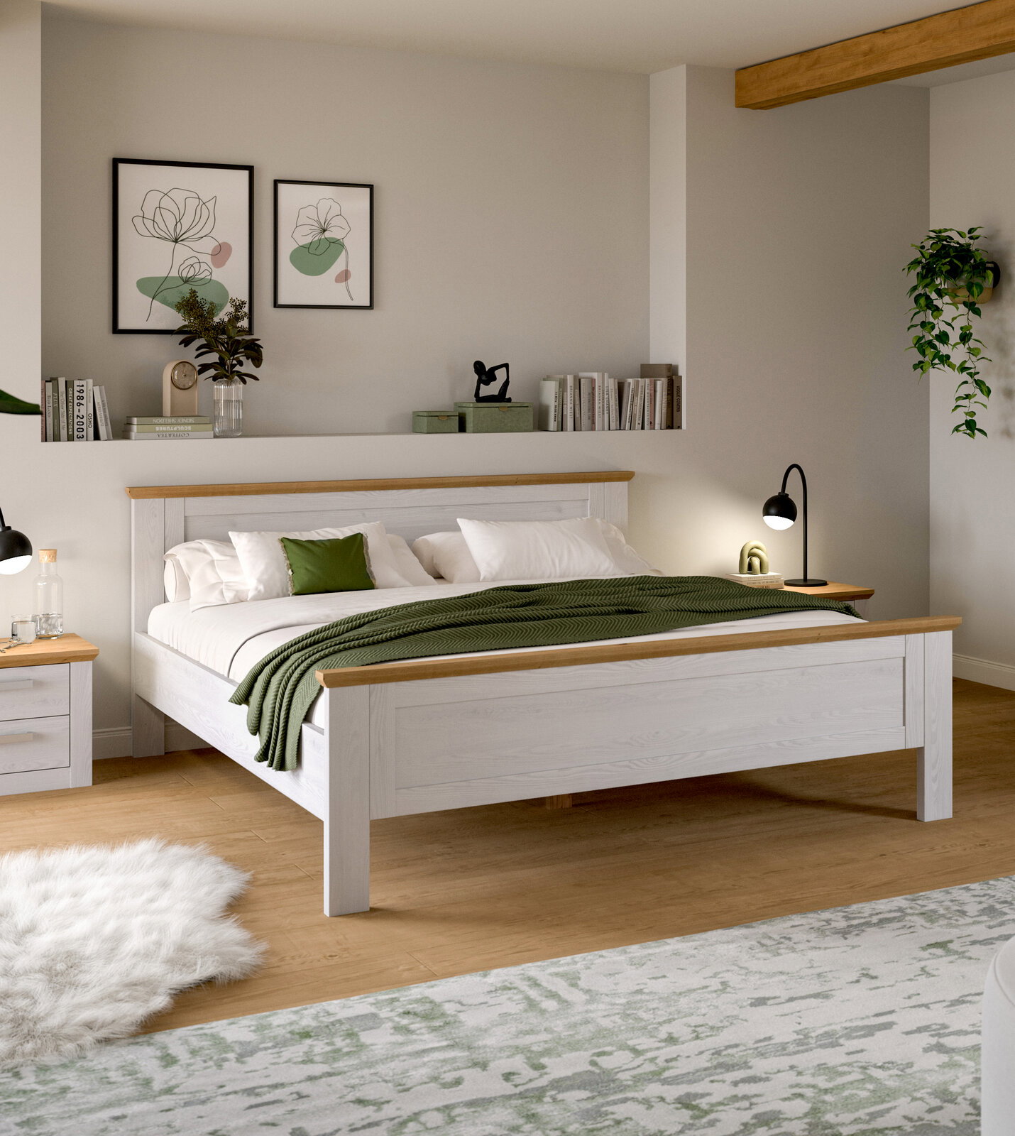MID.YOU Bettgestell VERONA Modernes Doppelbett aus weißem Holz mit naturfarbenen Akzenten, weißer Bettwäsche und grüner Tagesdecke im hellen Schlafzimmer, perspektivisch in schräger Frontansicht von leicht rechts.