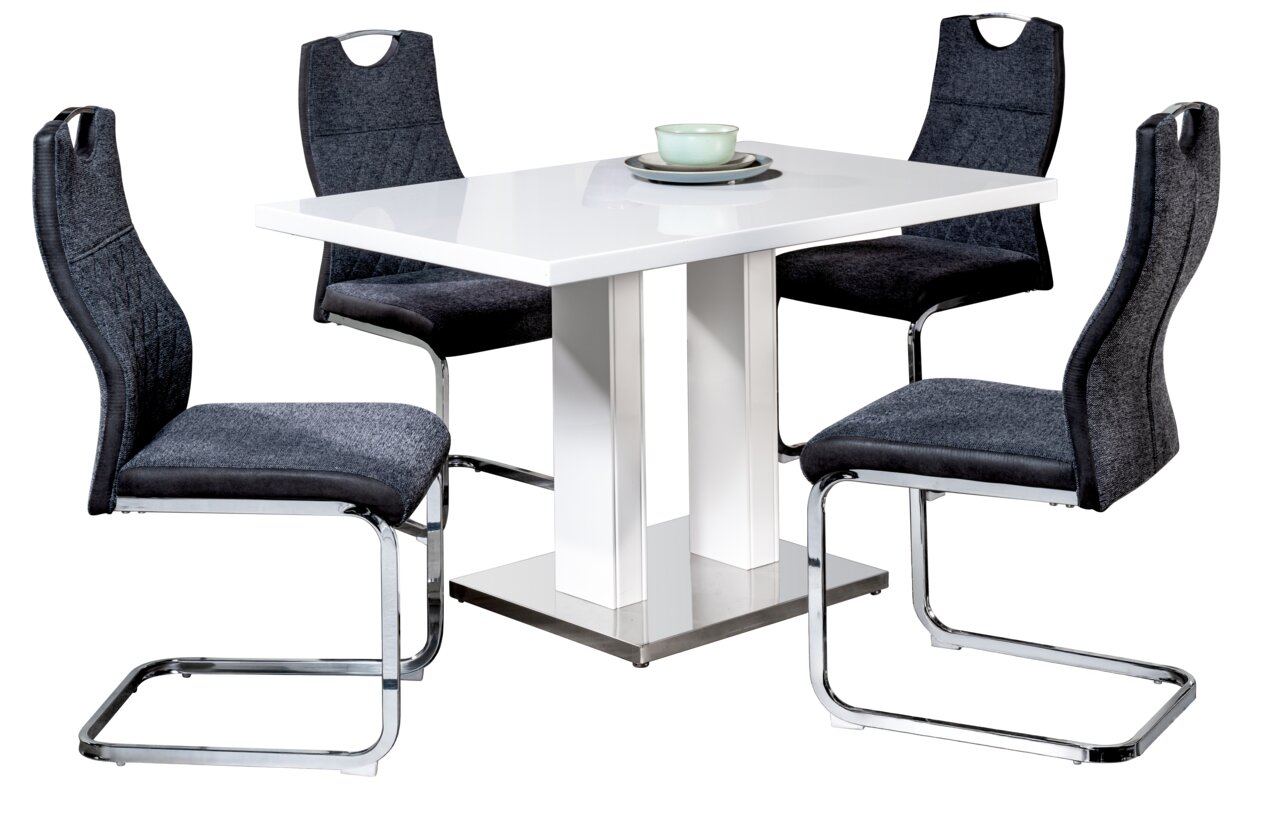 Moderner Schwingstuhl in Dunkelgrau mit verchromtem Gestell, um einen weißen Tisch arrangiert, seitliche Perspektive.