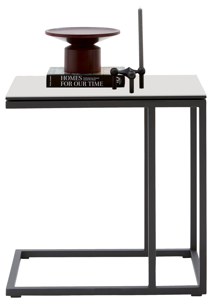 Moderner Beistelltisch mit schwarzem Metallrahmen und heller Tischplatte, seitliche Perspektive. Dekoriert mit einem Buch, einer Kerze und einer Schale.