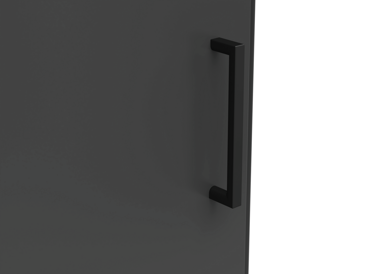 Nahaufnahme eines schwarzen Griffs an einer dunklen Oberfläche, seitliche Perspektive.