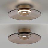 Moderne Deckenleuchte PURE Moon in seitlicher und unterer Perspektive, mit elegantem, kreisförmigem Design und warmem Licht.