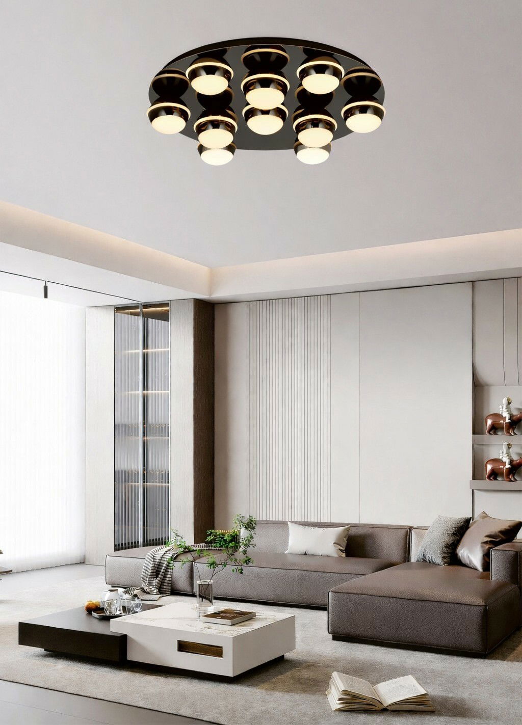 Moderne LED-Deckenleuchte mit neun runden Leuchtkörpern, von unten betrachtet in einem stilvollen Wohnzimmer.