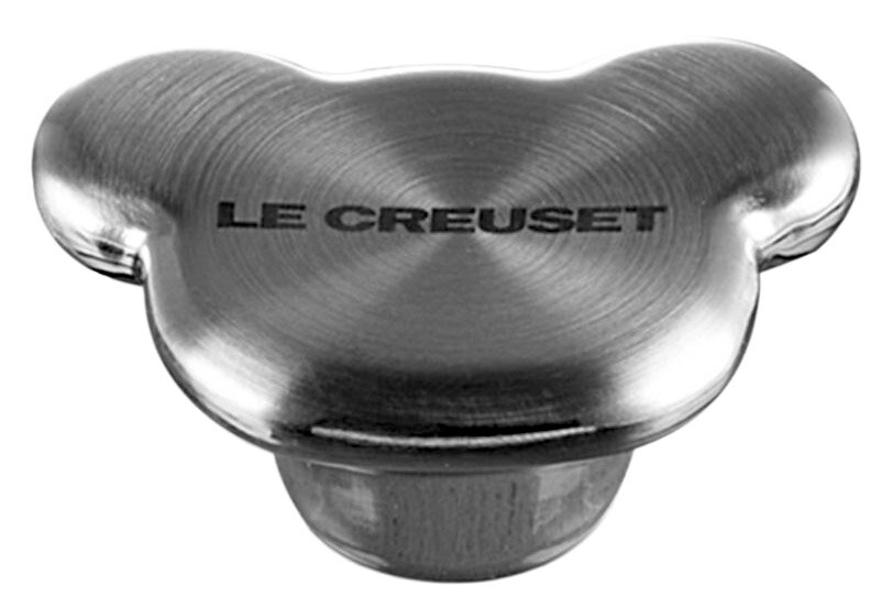 Deckelknauf in Bärenform aus Edelstahl mit der Aufschrift 'Le Creuset', Ansicht von oben.