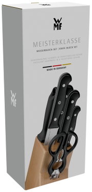 WMF Meisterklasse Messerblock-Set in weißer Verpackung mit Holz-Messerblock, schwarzen Messern und Küchenschere, schräg von vorn links fotografiert