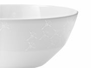 Weiße Schale mit dezentem Muster, seitliche Perspektive