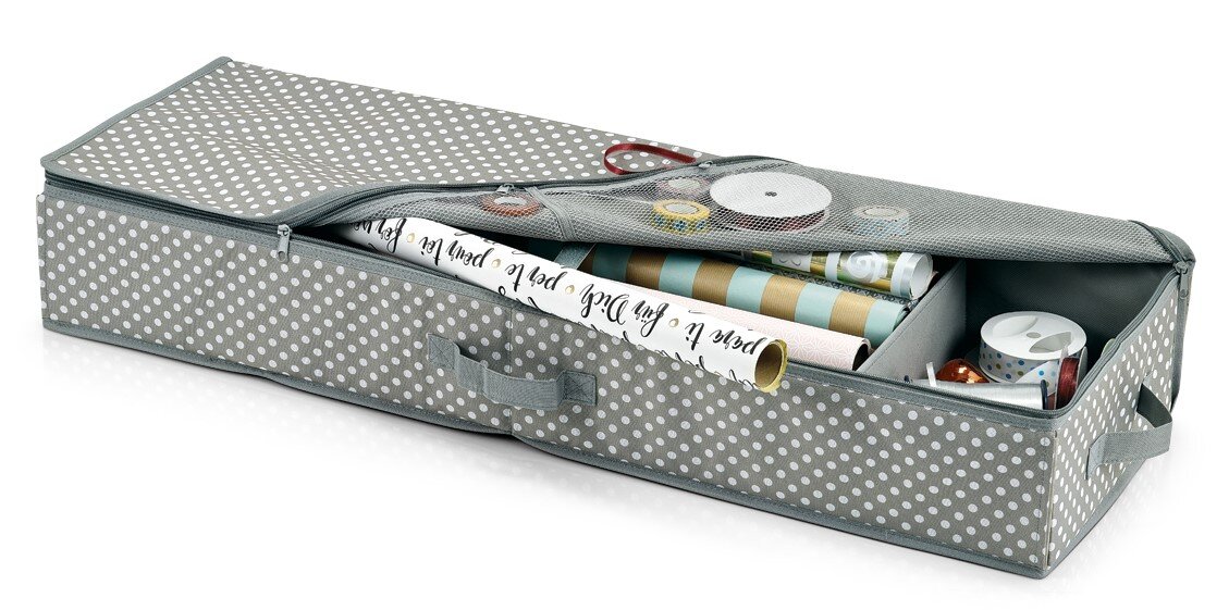 Geschenkpapier-Organizer in grauem Punktmuster, geöffnet mit sichtbaren Rollen und Bändern, seitliche Perspektive