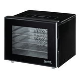 Schwarzer Dörrautomat mit Glastür und mehreren Einschüben, seitliche Perspektive