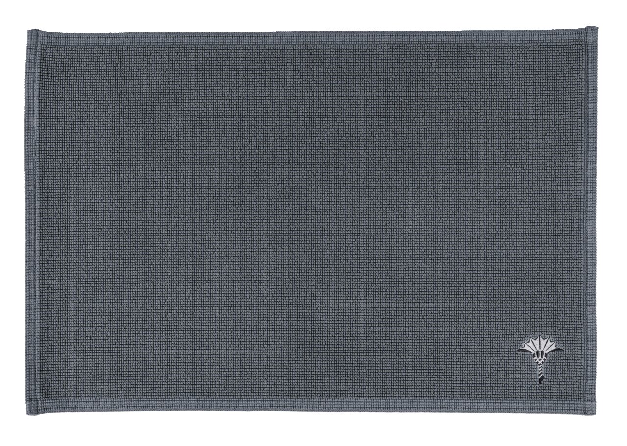 Grauer Badteppich 60 x 90 cm mit dezenter Struktur und kleinem Muster in der Ecke, Draufsicht