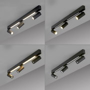 Schwarze, moderne Deckenleuchte in länglicher Balkenform mit integrierter LED-Lichtleiste und drei zylindrischen, verstellbaren Spotstrahlern, eingeschaltet, aus schräger Untersicht an der Decke fotografiert.