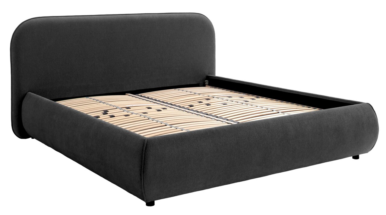Seitliche Ansicht eines modernen Polsterbetts mit dunklem Stoffbezug und sichtbarem Lattenrost.
