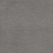 Nahaufnahme eines grauen Stoffbezugs, verwendet für ein Boxspringbett