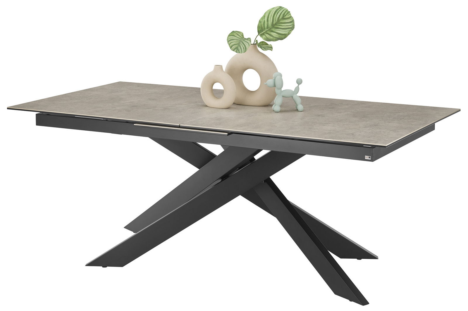 Moderner Esstisch mit grauer Tischplatte und schwarzem, gekreuztem Metallgestell, seitliche Perspektive