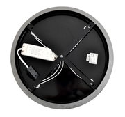 Achterkant van een ronde led-plafondlamp met zichtbare bedrading en montagebeugel.