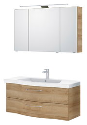 Moderner Badblock mit Holzoptik, bestehend aus einem Spiegelschrank mit Beleuchtung und einem Waschbeckenunterschrank mit zwei Schubladen, seitliche Perspektive.