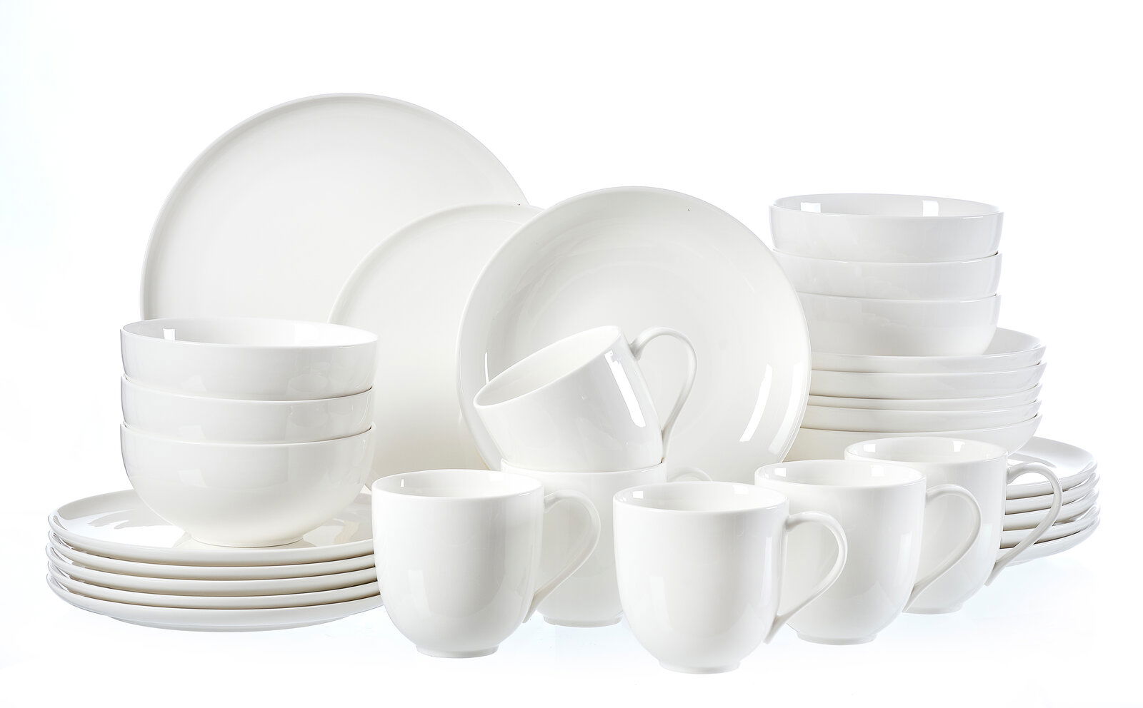 Ritzenhoff & Breker Kombiservice 30-tlg. SKAGEN Weißes Kombiservice Skagen 30-teilig, bestehend aus Tellern, Schalen und Tassen, aus seitlicher Perspektive fotografiert.