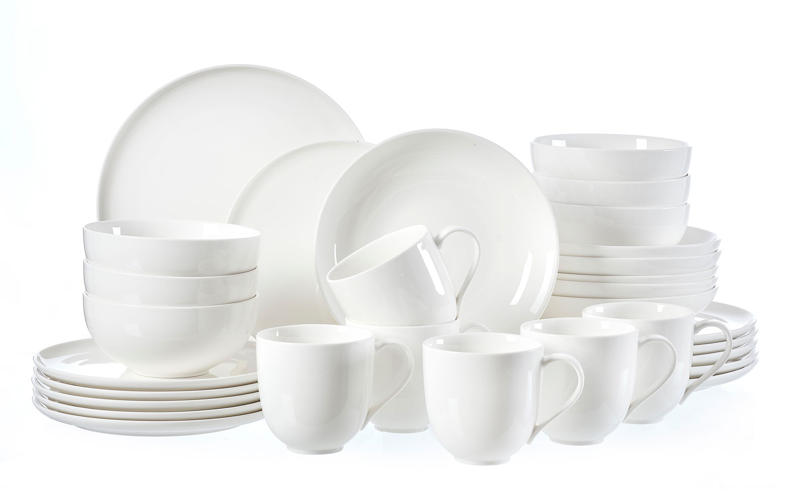 Ritzenhoff & Breker Kombiservice 30-tlg. SKAGEN Weißes Kombiservice Skagen 30-teilig, bestehend aus Tellern, Schalen und Tassen, aus seitlicher Perspektive fotografiert.