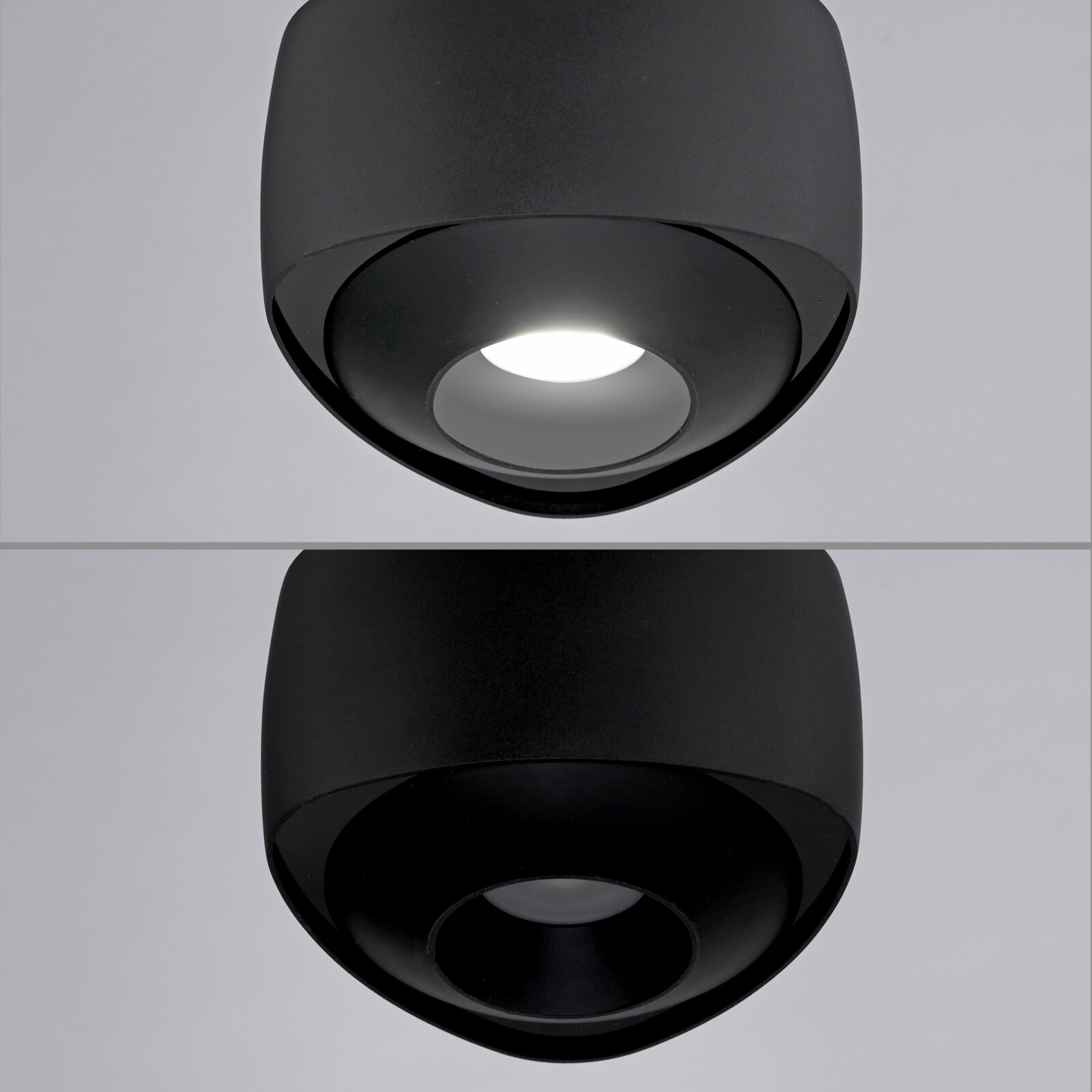 Schwarze, runde LED-Deckenaufbauleuchte mit zylindrischem Gehäuse und tief eingelassener Linse/Reflektor, in leicht schräger Untersicht von unten fotografiert